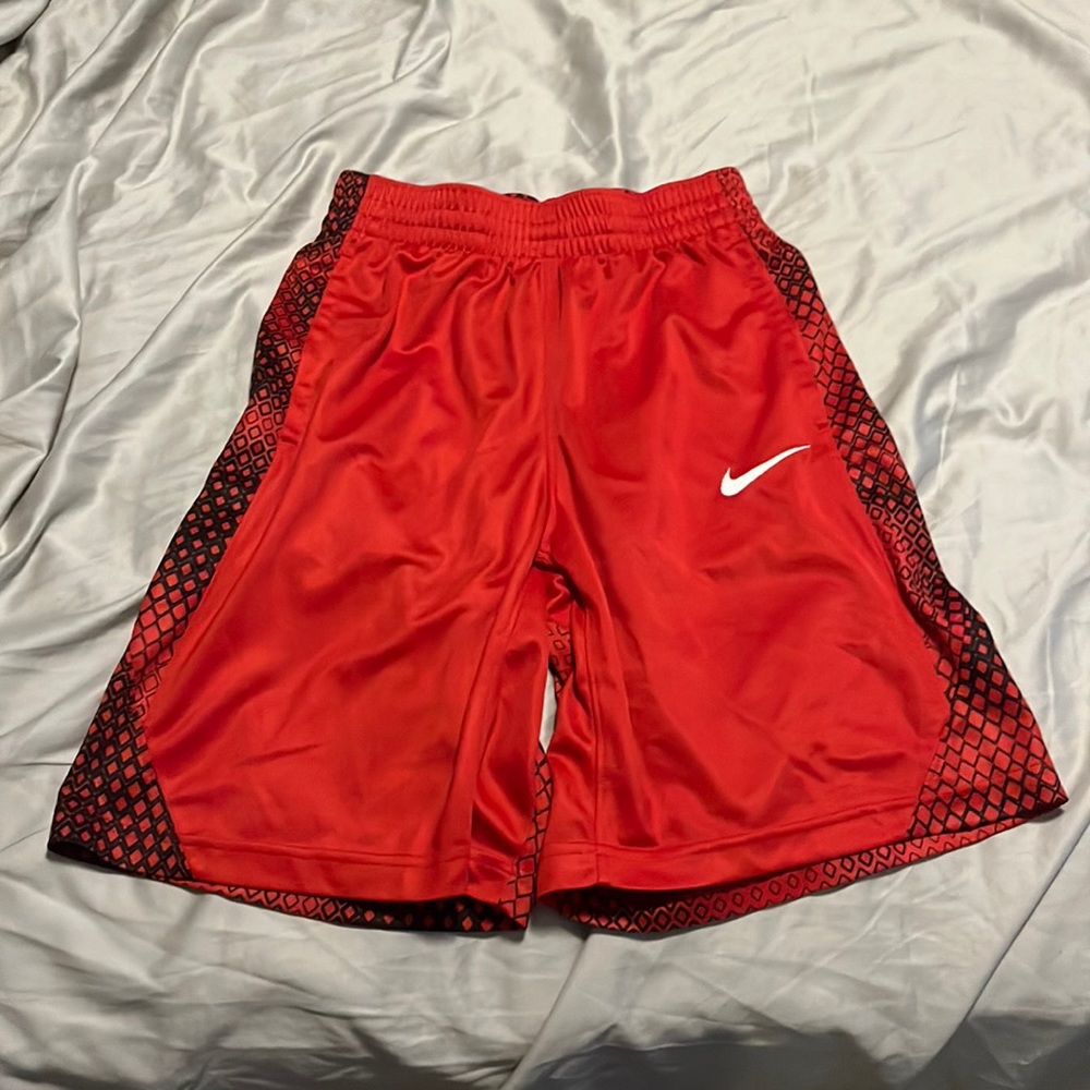 Red Nike shorts